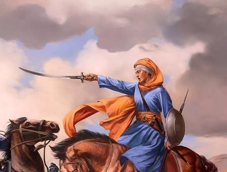 Who was the lady who performed the funeral rites of the martyrs of Chamkaur?