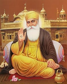 What is in Guru Nanak Ji’s hand?